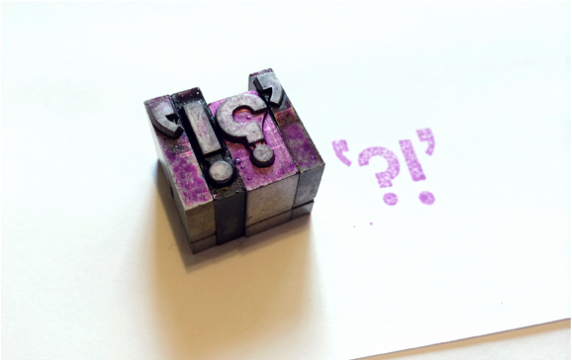 Lead type blocks '?!' and print with blocks in purple